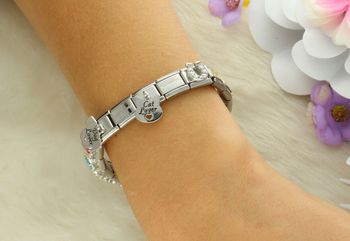 Stylowa zawieszka Nomination Composable z motywem podkowy na szczęście. Srebro 925, białe cyrkonie. Idealna do spersonalizowanej bransoletki lub jako prezent (1).jpg